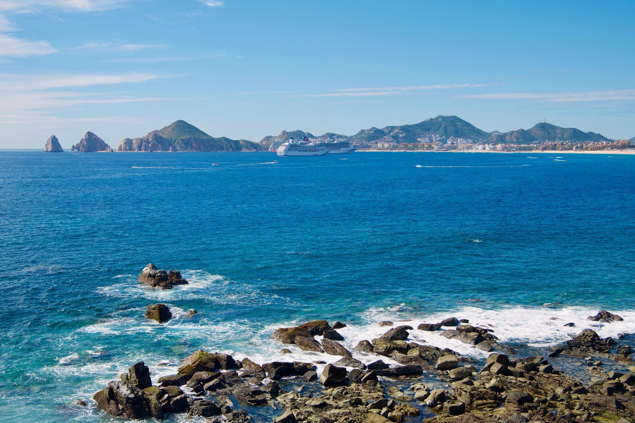 Cabo San Lucas marina and coastline at sunset